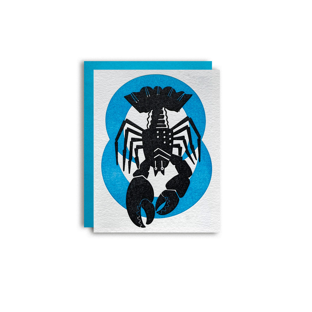  Cancer zodiac letterpress birthday card. Lobster Crawdad Crayfish black letterpress printed. Neon blue pattern in background symbolizing water element. Shown with kraft envelope