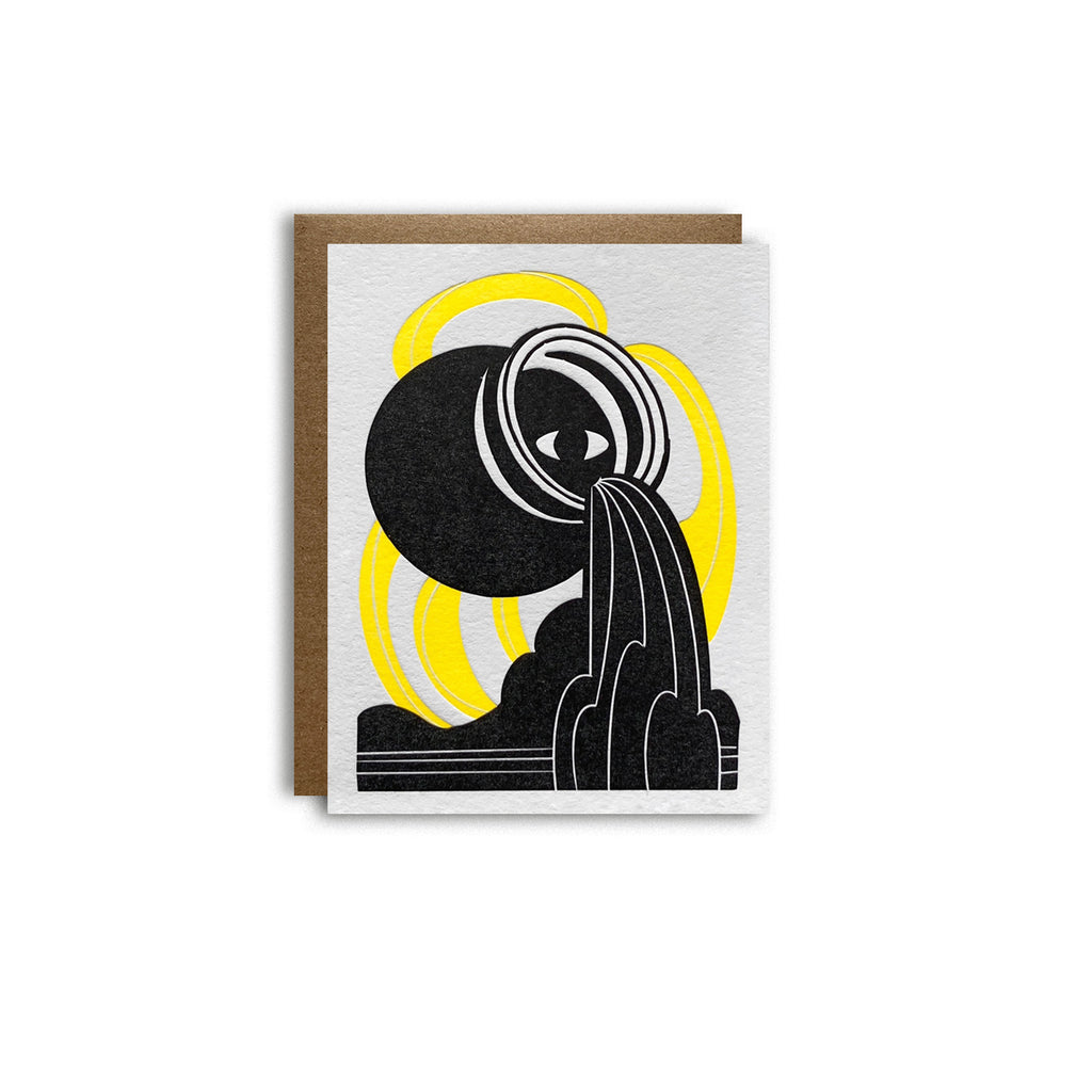 Aquarius letterpress birthday card. Black urn with all seeing eye pouring water into a esoteric waterfall. Neon yellow pattern in background symbolizing air element. Shown with kraft paper A2 envelope on a white background.